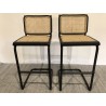 Set of 2 black wood and natural rattan island stools with metal legs | Second Hand Set of 2 black wood and natural rattan island stools with metal legs | Second Hand